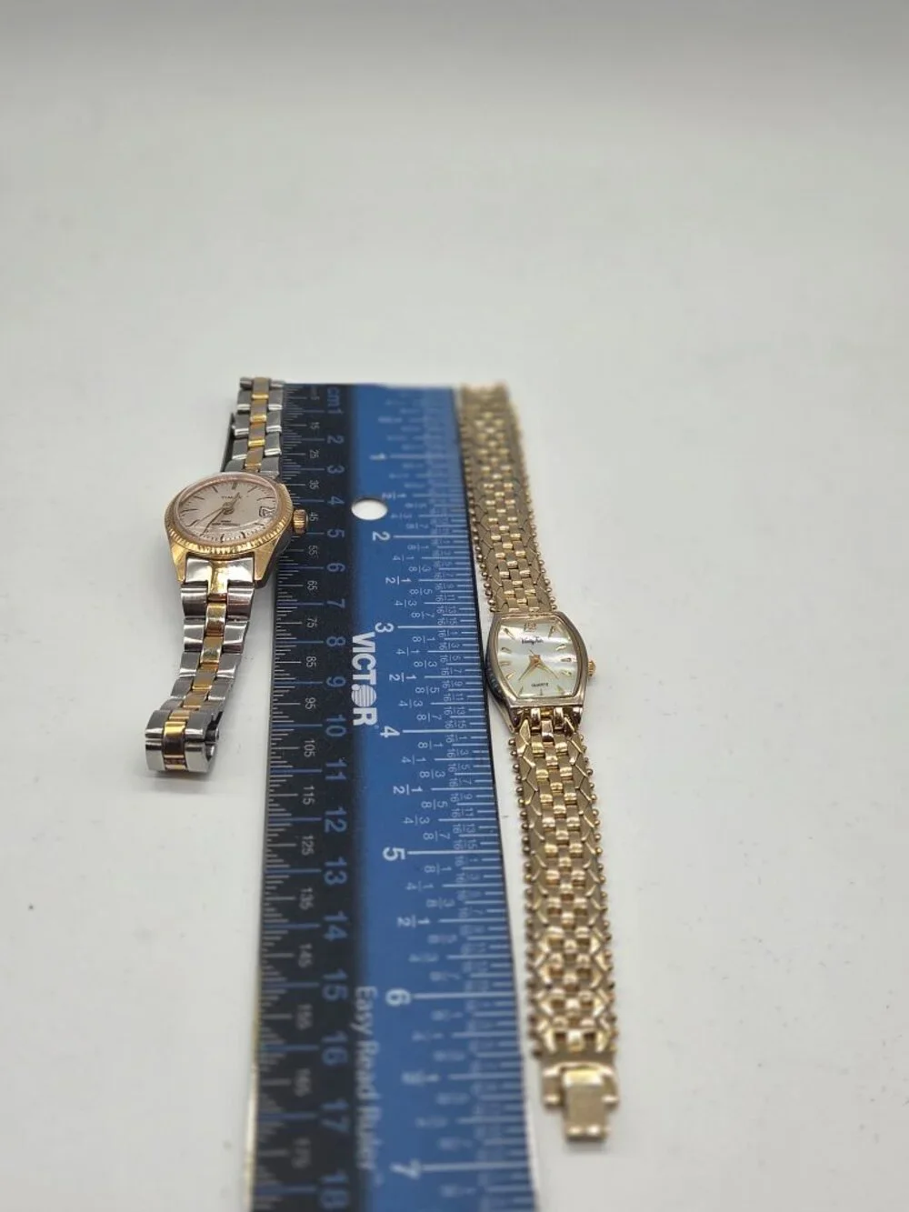 Pair of goldtone watches